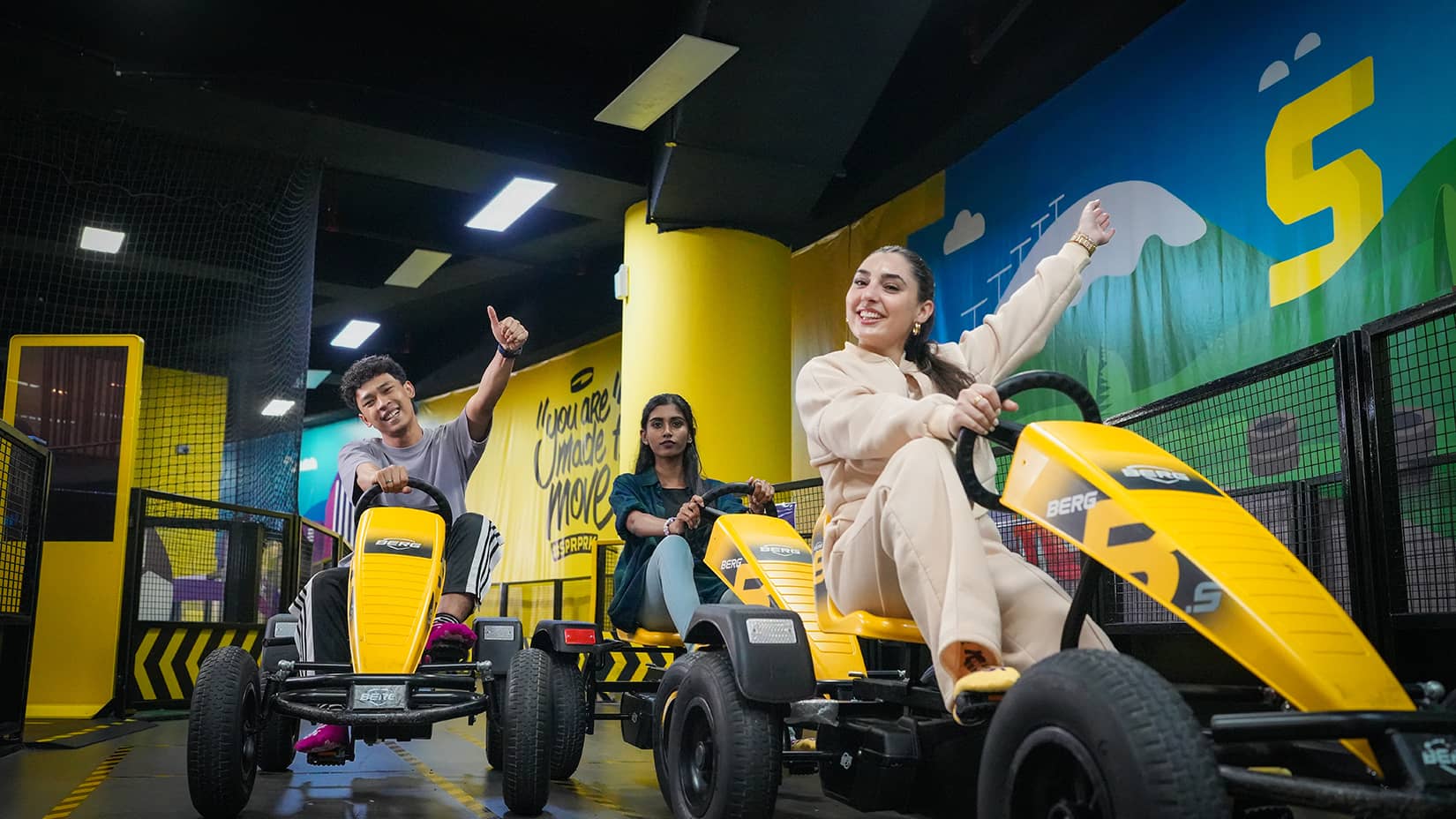 Visitors riding pedal carts in the Adventure Area at SuperPark Malaysia in Kuala Lumpur